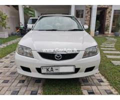 Mazda Familia BJ5P - 2001