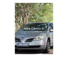 Nissan premera p12 - 2004
