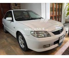 Mazda Familia BJ5P - 2001