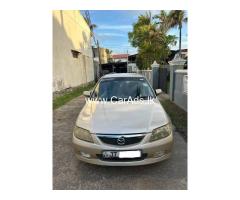 Mazda 323 - 2002